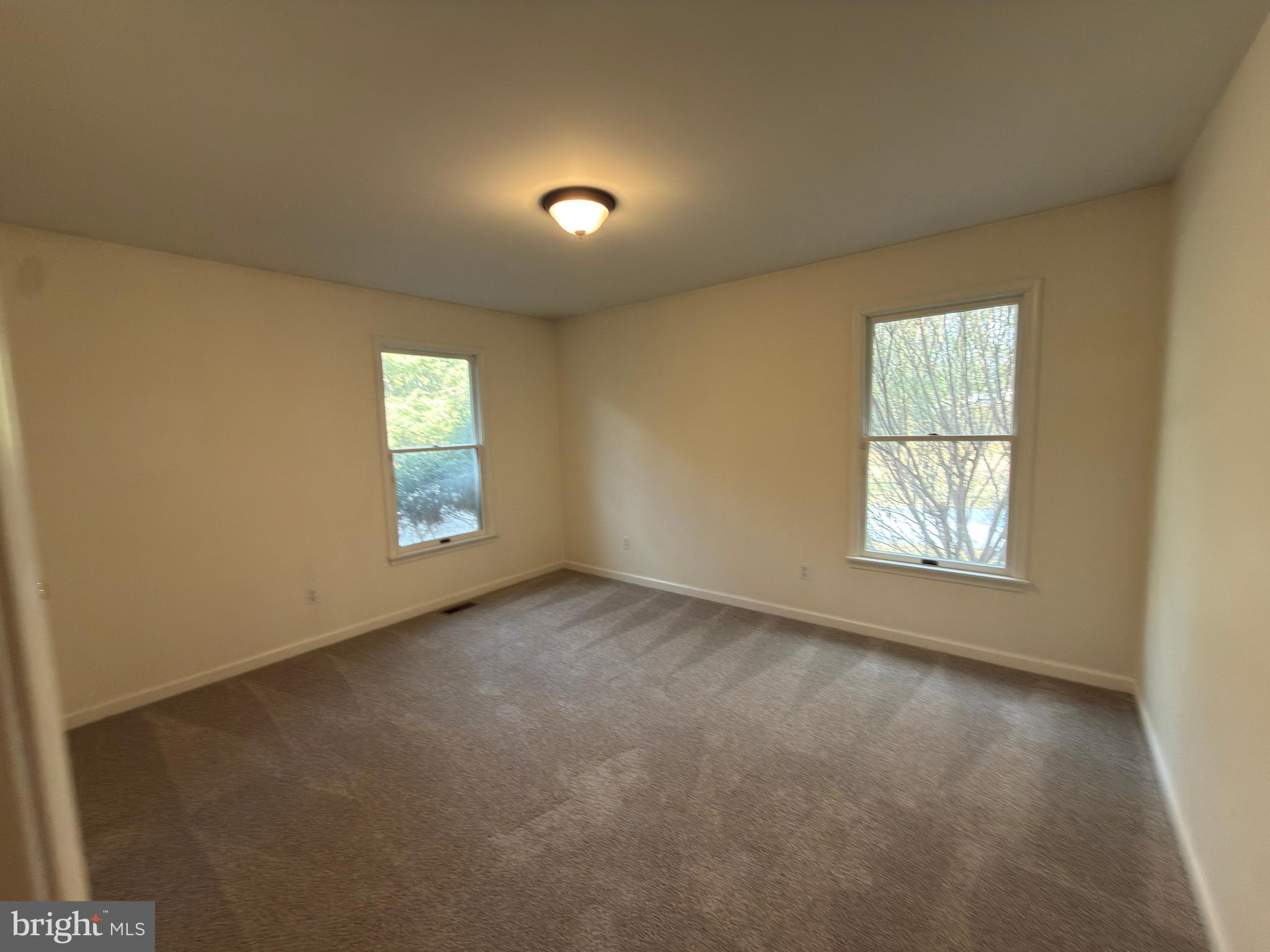 839 Frank Road West Chester, PA 19380 - Photo 22 of 30 an empty room with windows