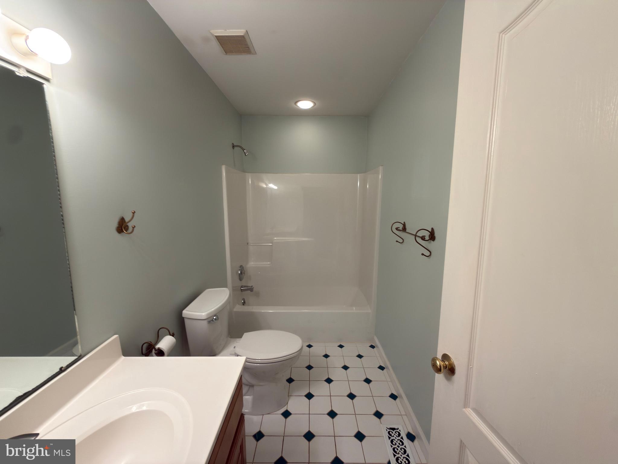 839 Frank Road West Chester, PA 19380 - Photo 23 of 30 a bathroom with a sink a toilet and shower
