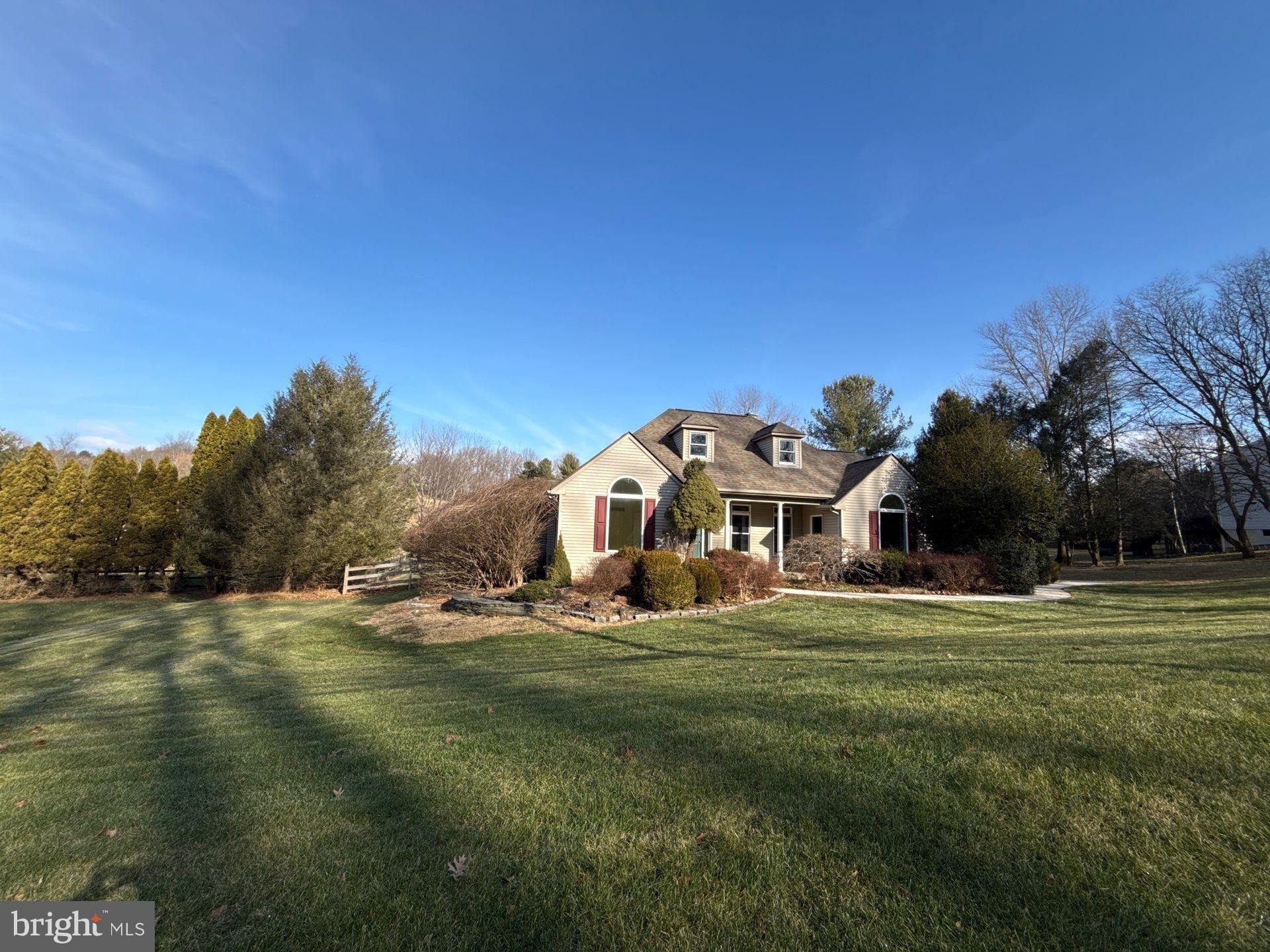 839 Frank Road West Chester, PA 19380 - Photo 5 of 30 a front view of a house with a yard