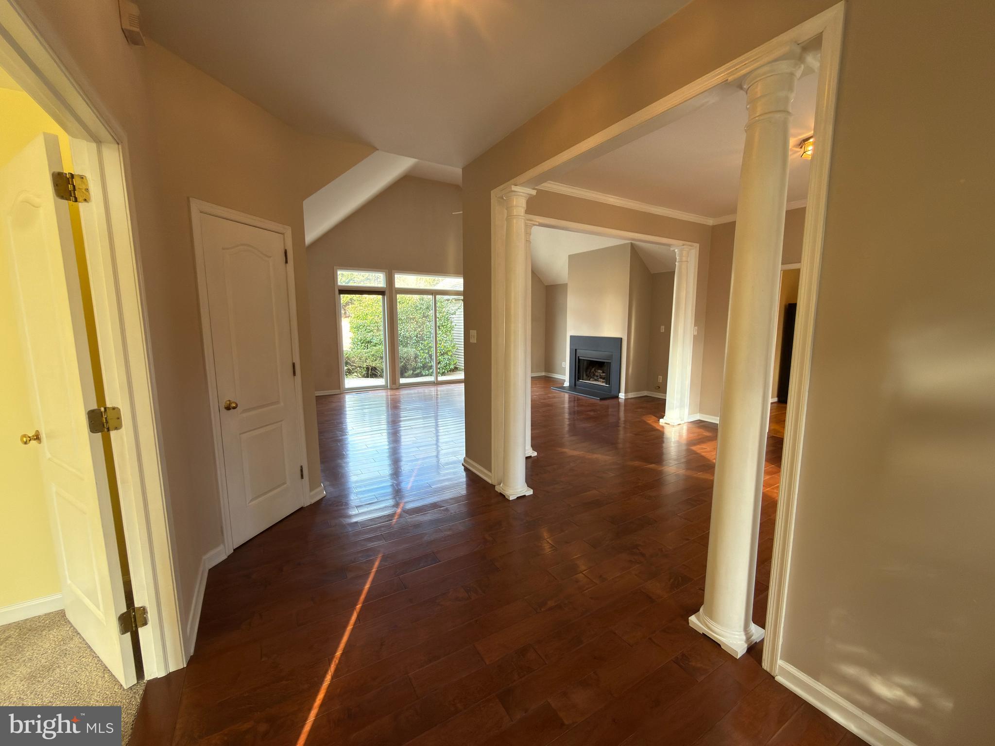 839 Frank Road West Chester, PA 19380 - Photo 6 of 30 a view of a hallway with wooden floor and a living room