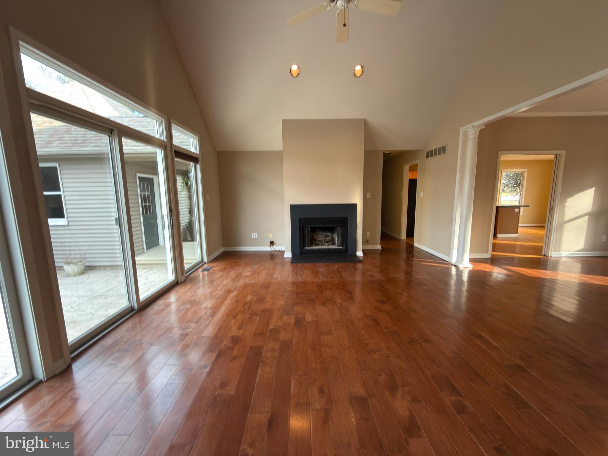 839 Frank Road West Chester, PA 19380 - Photo 8 of 30 a view of an empty room with a fireplace and a window