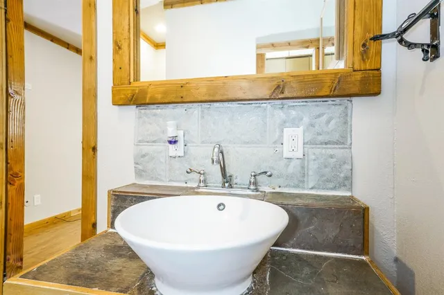 a bathroom with a sink and a bathtub