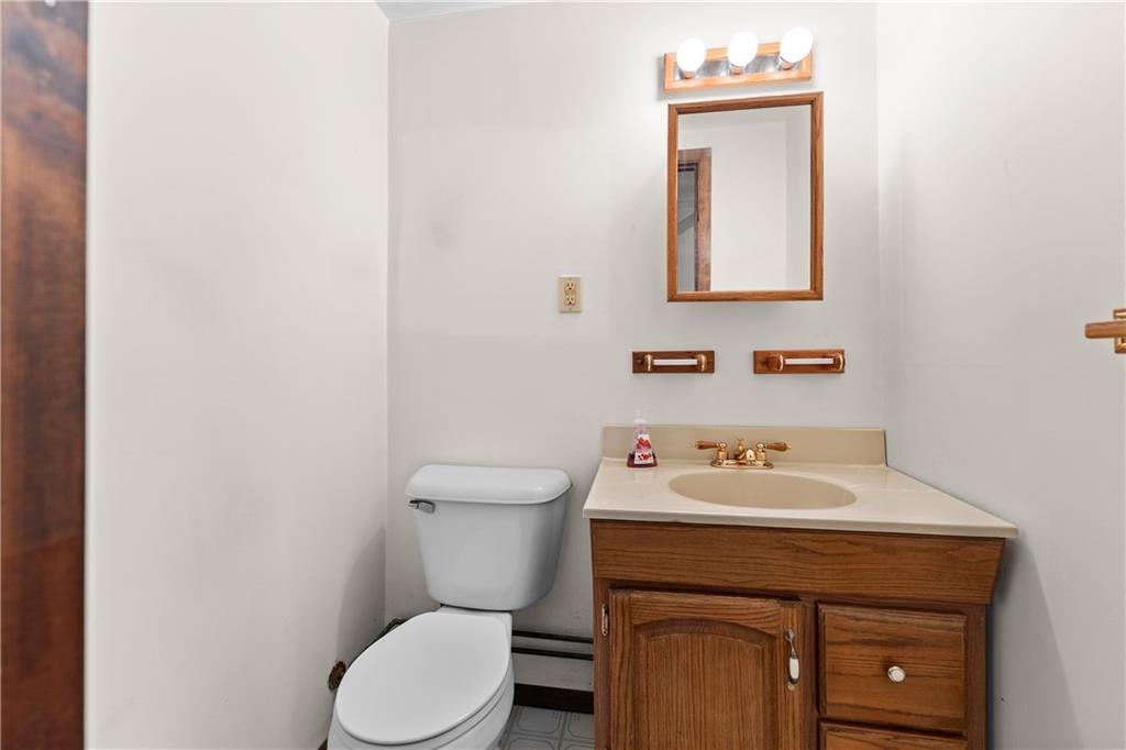 914 Bower Hill Road Pittsburgh, PA 15243 - Photo 14 of 30 a bathroom with a sink mirror and toilet