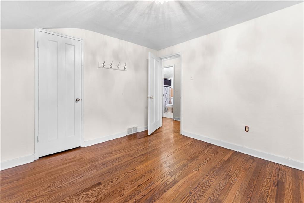 914 Bower Hill Road Pittsburgh, PA 15243 - Photo 15 of 30 a view of an empty room with wooden floor