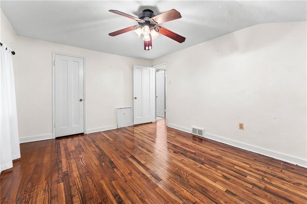 914 Bower Hill Road Pittsburgh, PA 15243 - Photo 18 of 30 a view of an empty room with window and wooden floor