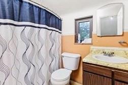 914 Bower Hill Road Pittsburgh, PA 15243 - Photo 24 of 30 a bathroom with a toilet sink and mirror