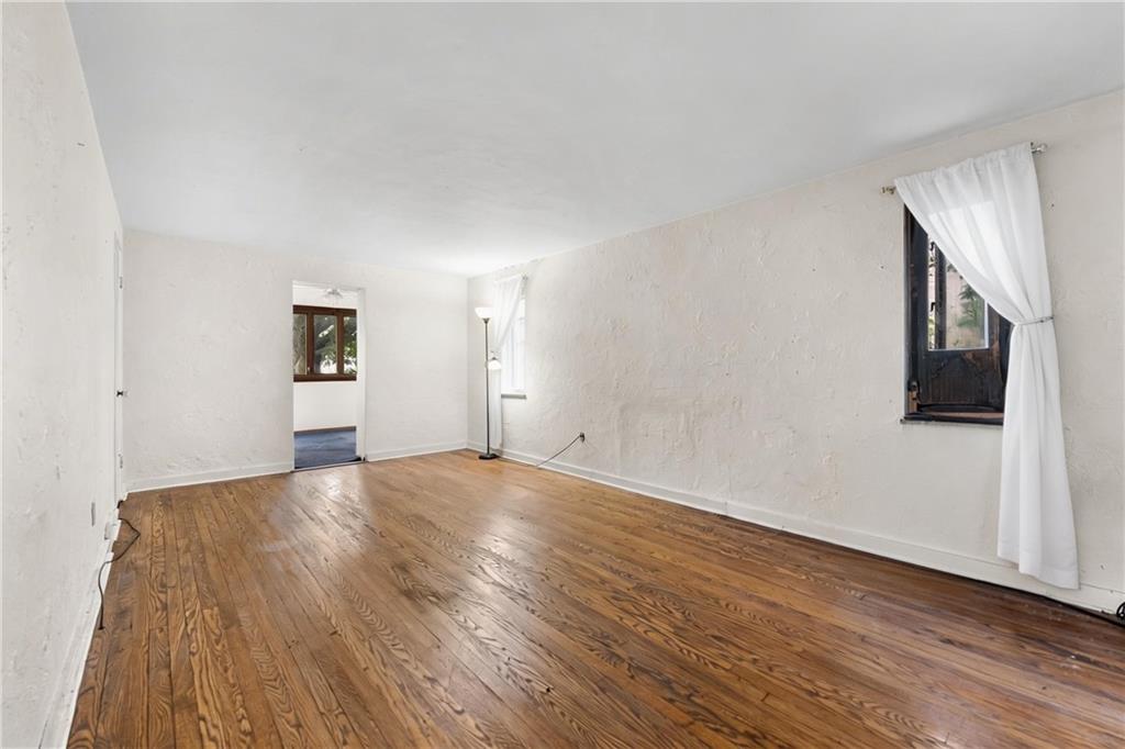 914 Bower Hill Road Pittsburgh, PA 15243 - Photo 5 of 30 a view of empty room with wooden floor and fan
