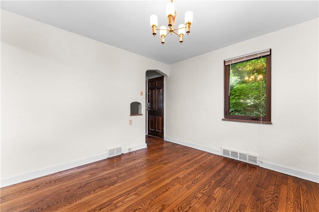 914 Bower Hill Road Pittsburgh, PA 15243 - Photo 8 of 30 an empty room with wooden floor and windows