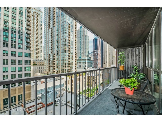 10 East Ontario Street, Unit 1109 Chicago, IL 60611 - Photo 8 of 11 a view of a chairs and table in the balcony