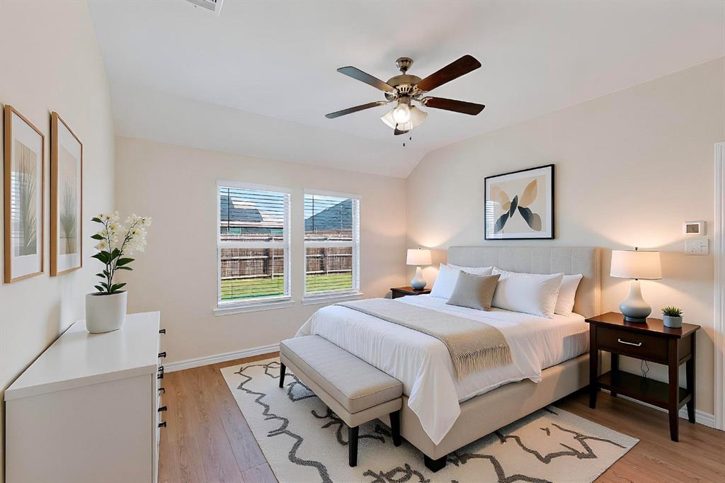 408 Rawhide Way Princeton, TX 75407 - Photo 16 of 36 a bedroom with a bed and a window