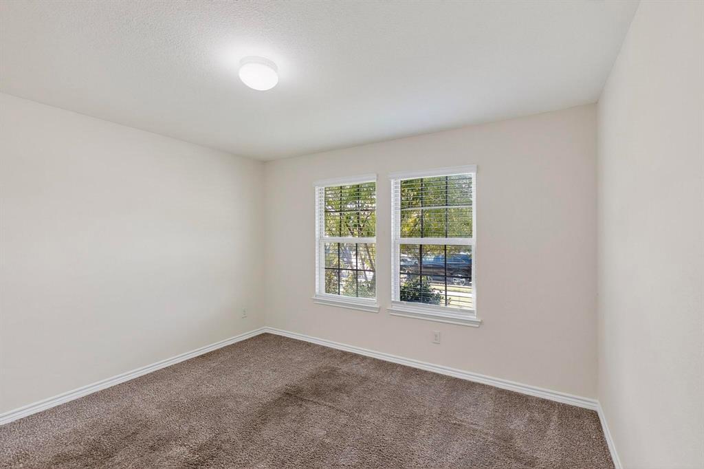 408 Rawhide Way Princeton, TX 75407 - Photo 30 of 36 an empty room with a window