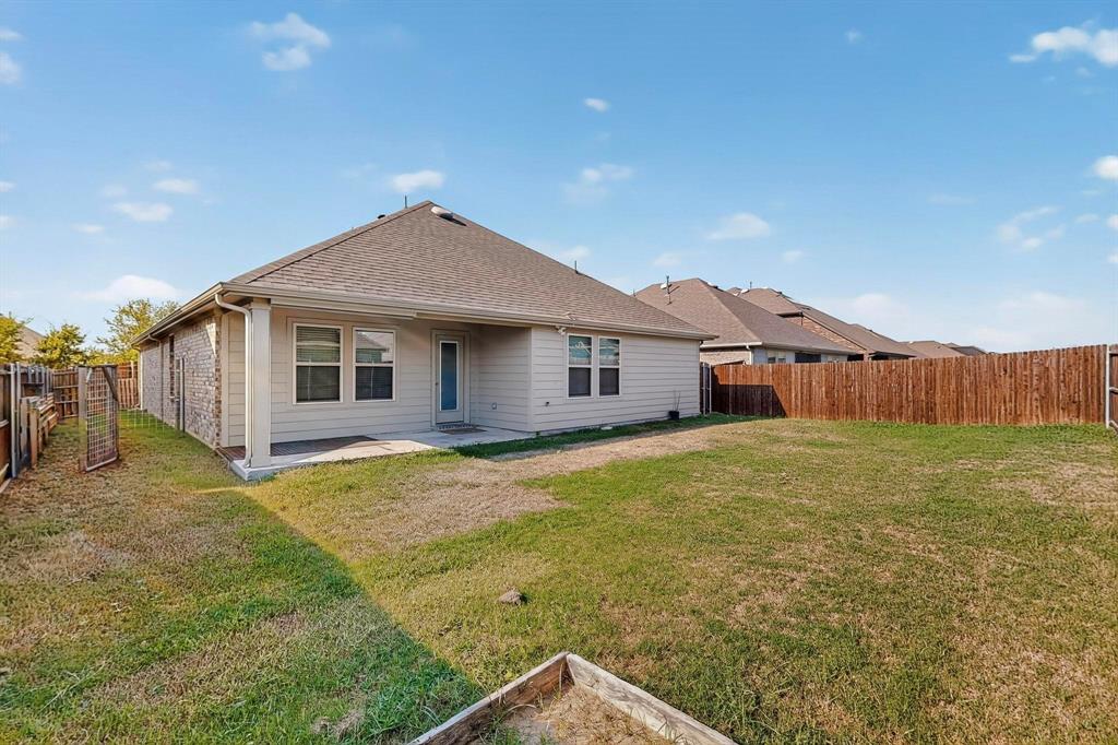 408 Rawhide Way Princeton, TX 75407 - Photo 35 of 36 a view of a house with a yard