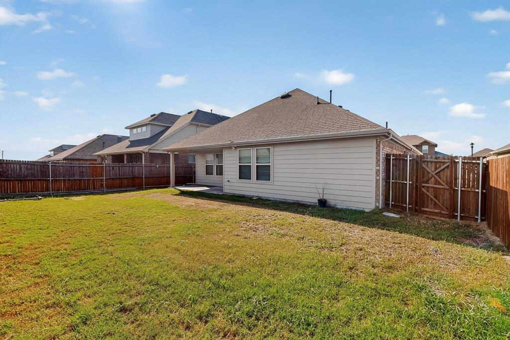 408 Rawhide Way Princeton, TX 75407 - Photo 36 of 36 a front view of house with yard and seating area
