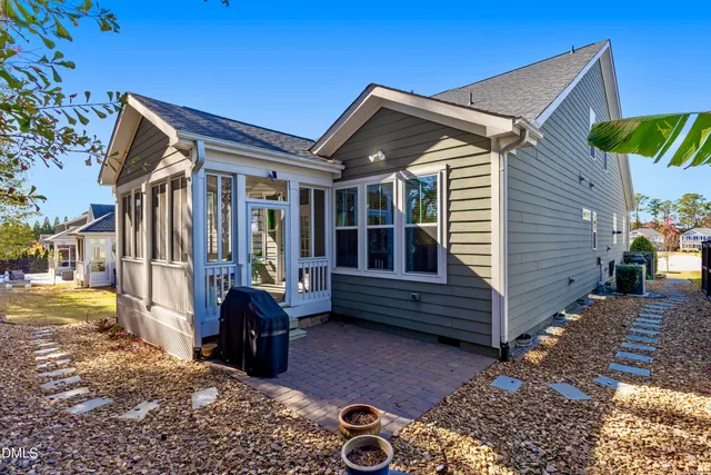 a front view of house with parking space