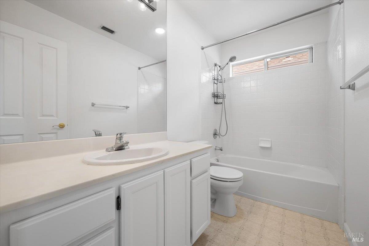 1028 Addison Circle Petaluma, CA 94952 - Photo 28 of 60 a bathroom with a sink a toilet and shower