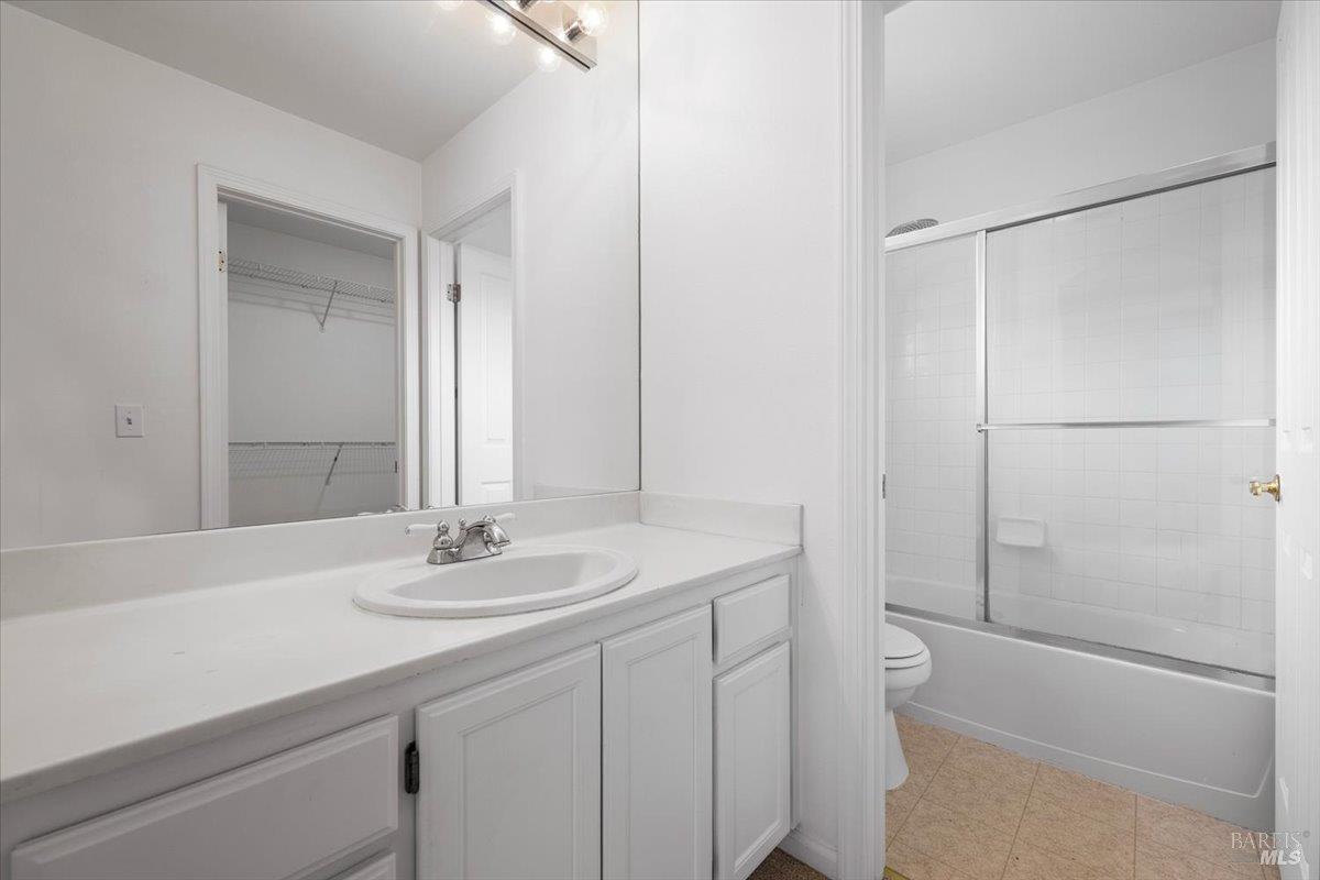1028 Addison Circle Petaluma, CA 94952 - Photo 36 of 60 a bathroom with a sink toilet and shower
