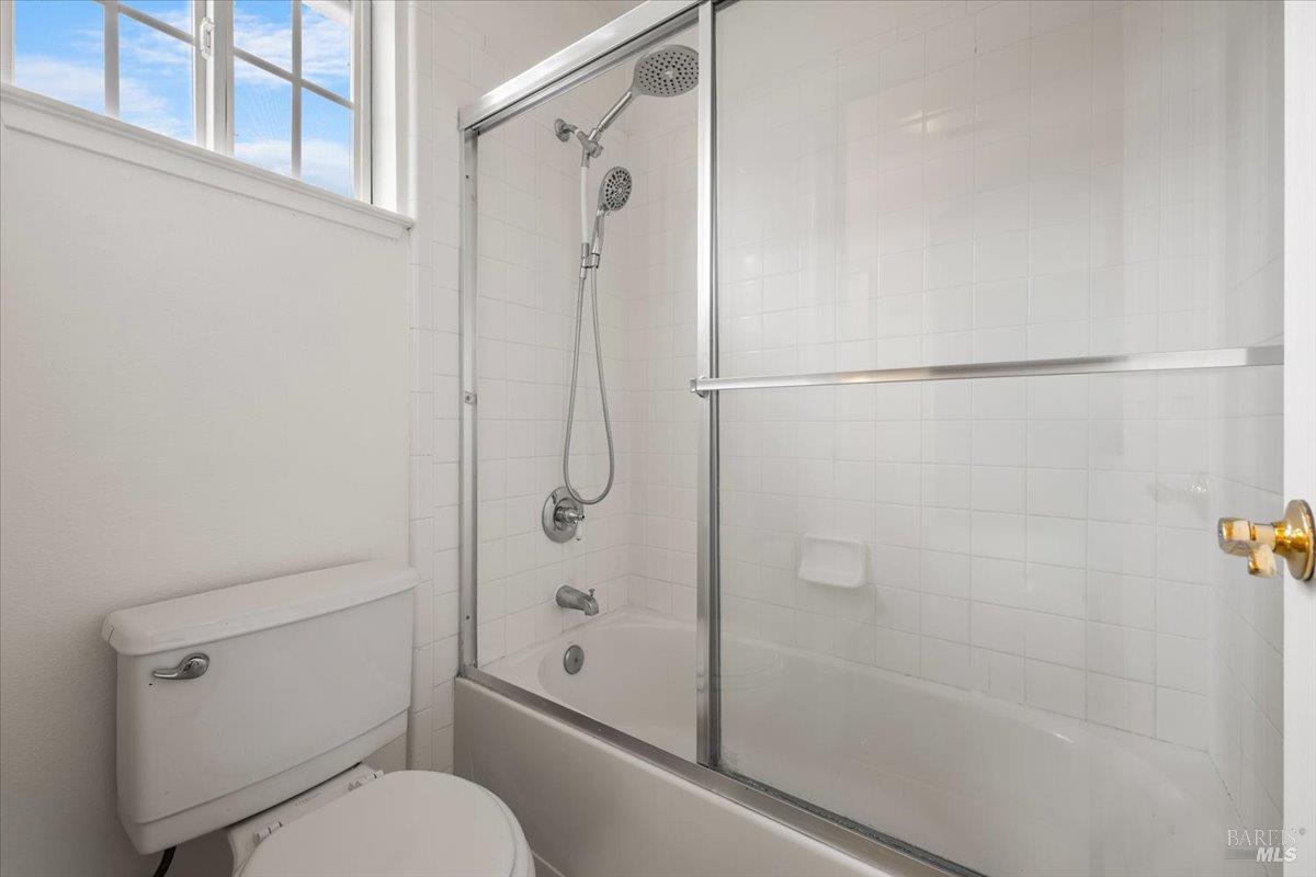 1028 Addison Circle Petaluma, CA 94952 - Photo 37 of 60 a bathroom with a toilet and a shower