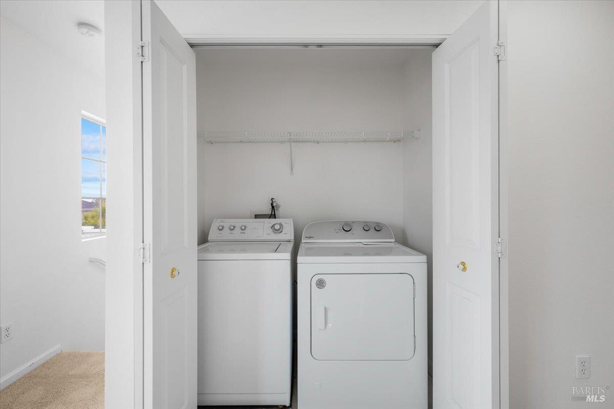 1028 Addison Circle Petaluma, CA 94952 - Photo 40 of 60 a utility room with dryer and washer
