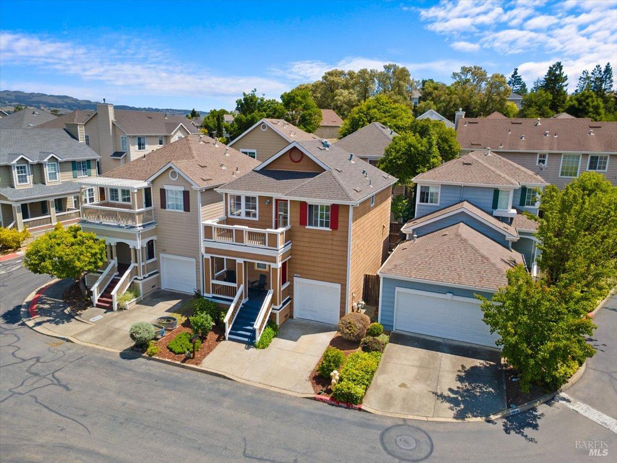 1028 Addison Circle Petaluma, CA 94952 - Photo 46 of 60 an aerial view of a house with a yard and potted plants