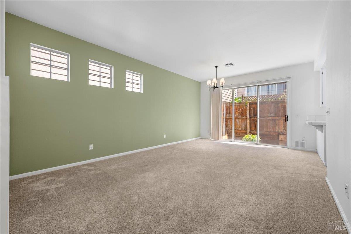1028 Addison Circle Petaluma, CA 94952 - Photo 7 of 60 a view of an empty room with a window