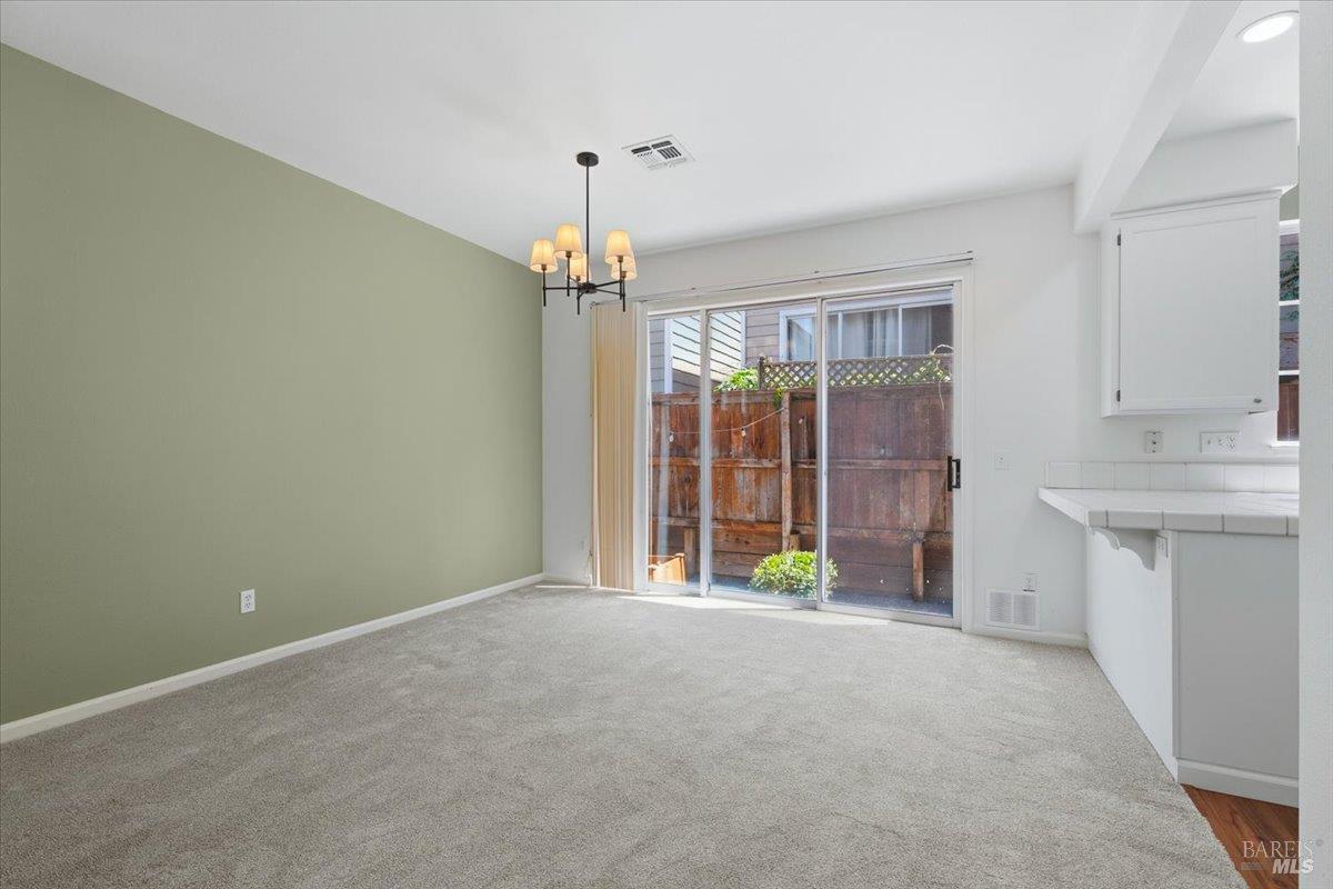 1028 Addison Circle Petaluma, CA 94952 - Photo 8 of 60 a view of an empty room with a window
