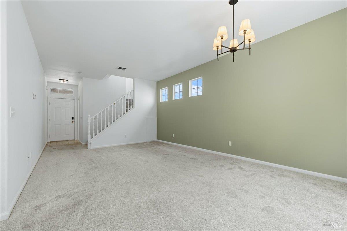 1028 Addison Circle Petaluma, CA 94952 - Photo 9 of 60 a view of empty room with a ceiling fan