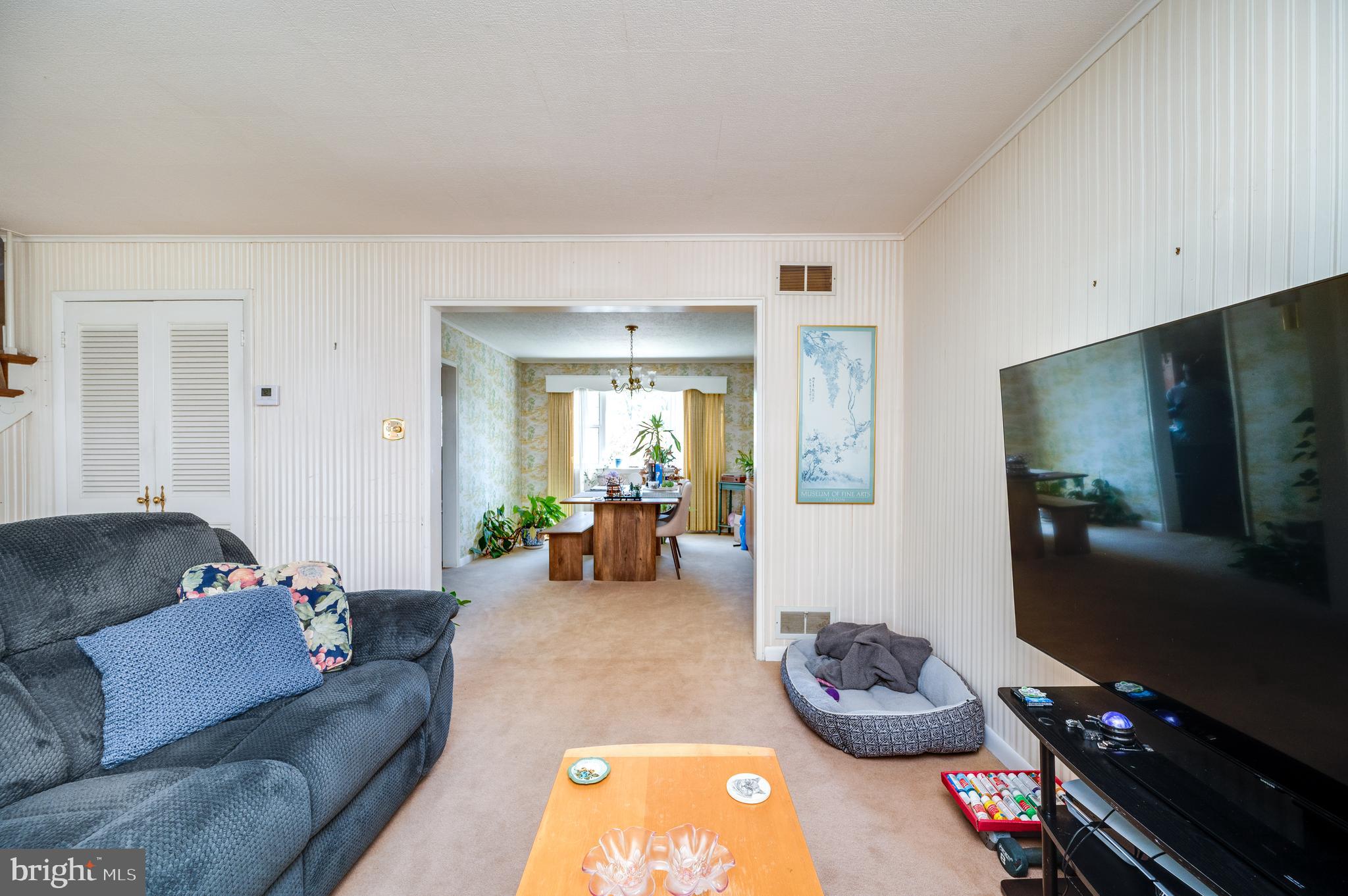 435 Sycamore Road Reading, PA 19611 - Photo 15 of 42 a living room with furniture and a flat screen tv