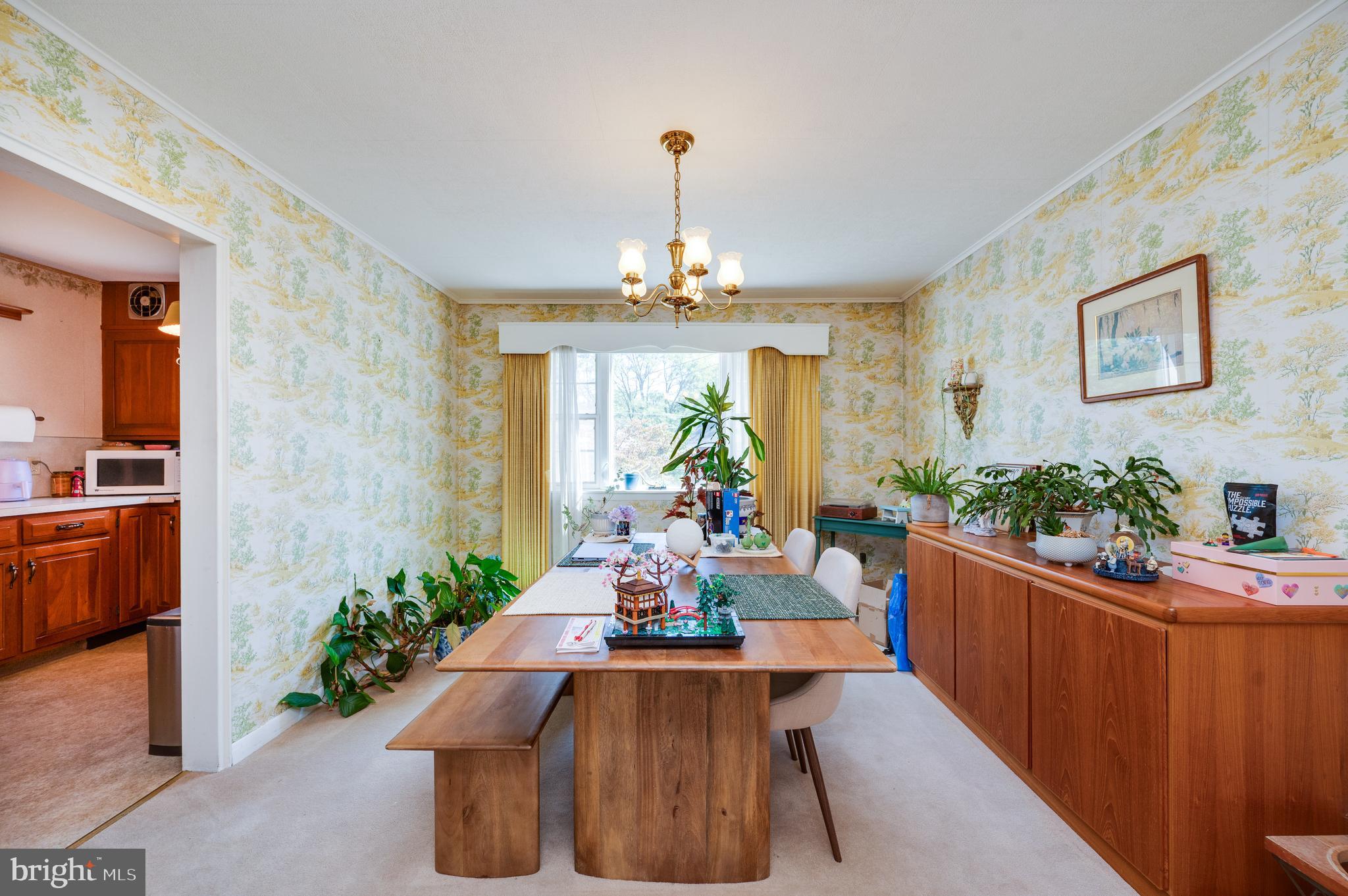435 Sycamore Road Reading, PA 19611 - Photo 16 of 42 a view of a dining room with furniture window and wooden floor