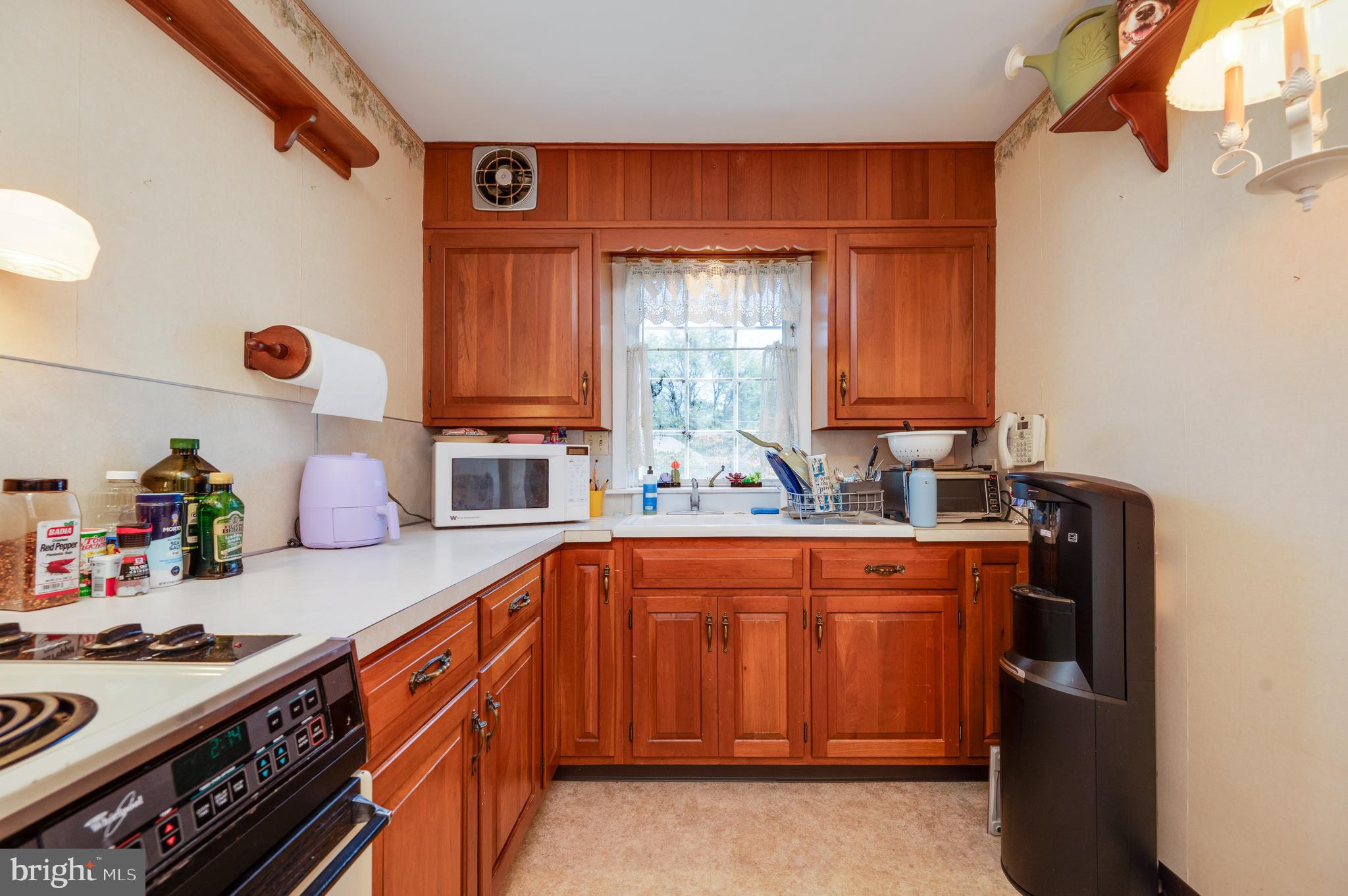 435 Sycamore Road Reading, PA 19611 - Photo 20 of 42 a kitchen with stainless steel appliances a sink and a stove