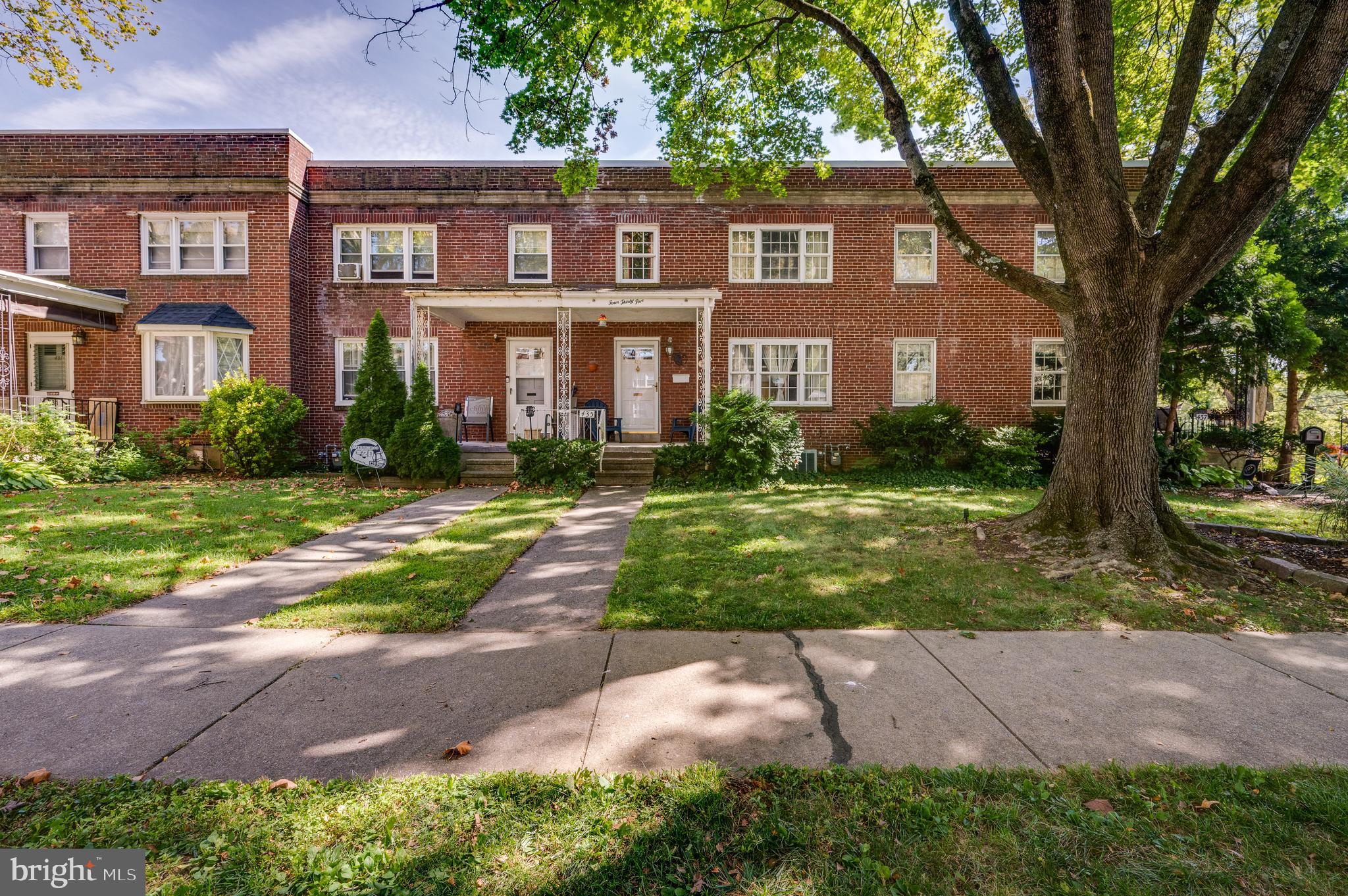 435 Sycamore Road Reading, PA 19611 - Photo 2 of 42 a front view of a house with yard and green space