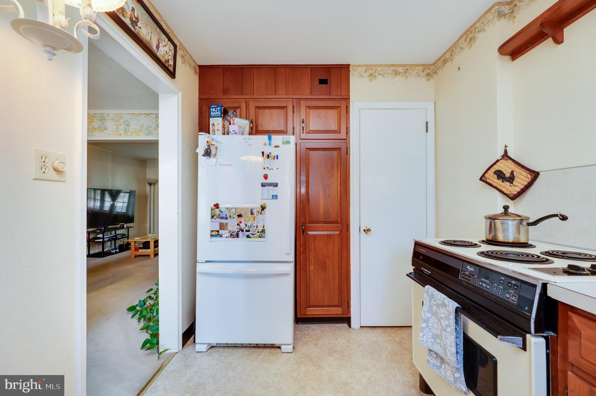 435 Sycamore Road Reading, PA 19611 - Photo 21 of 42 a kitchen with stainless steel appliances granite countertop a refrigerator and a stove