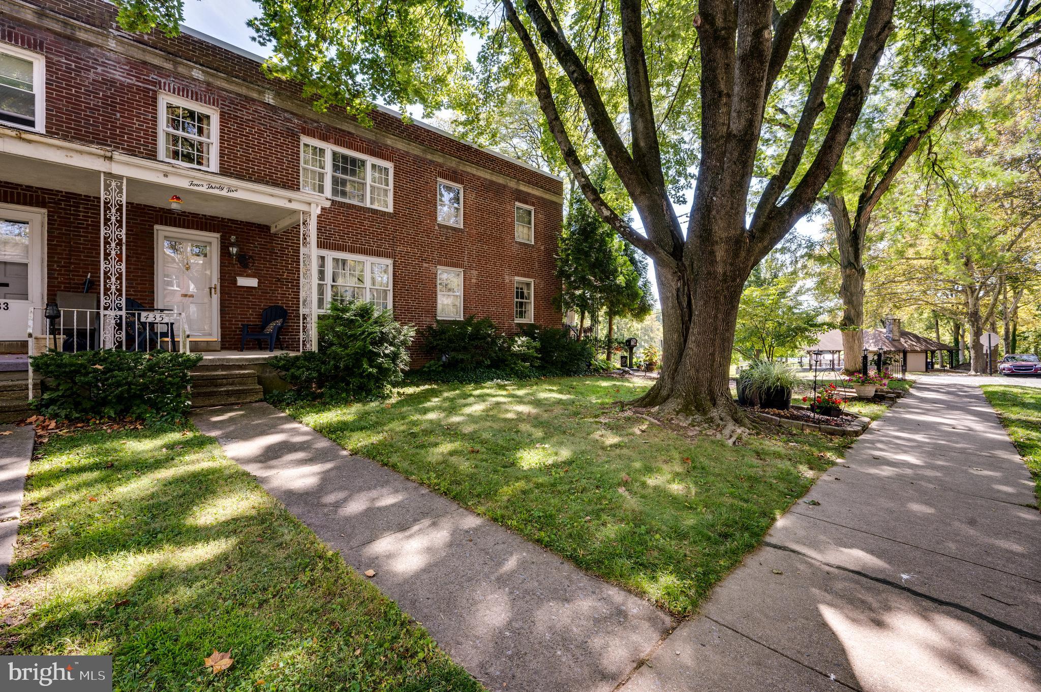 435 Sycamore Road Reading, PA 19611 - Photo 3 of 42 a front view of a house with garden