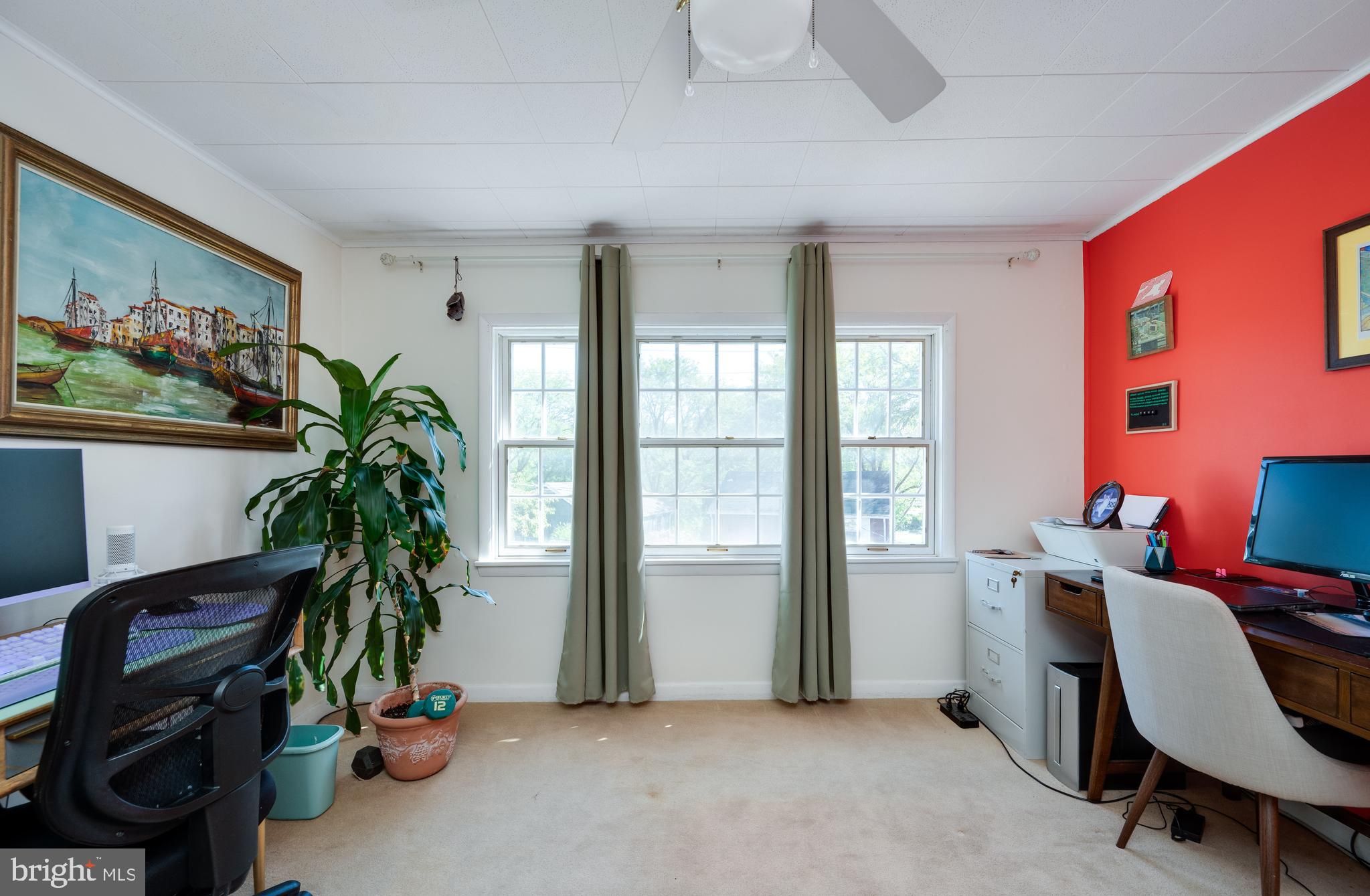 435 Sycamore Road Reading, PA 19611 - Photo 36 of 42 a workspace with furniture and a potted plant