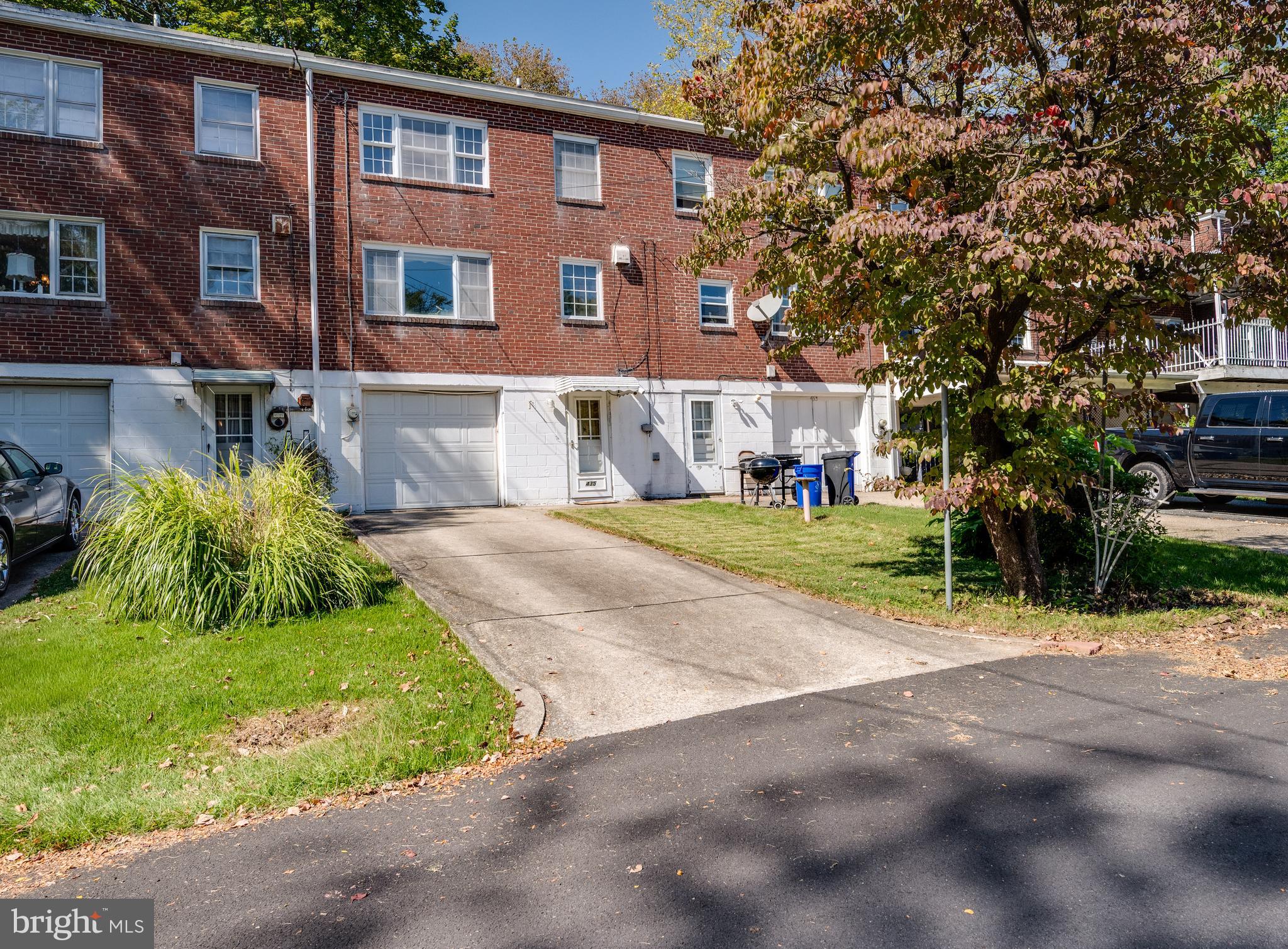 435 Sycamore Road Reading, PA 19611 - Photo 37 of 42 a view of a brick building next to a yard