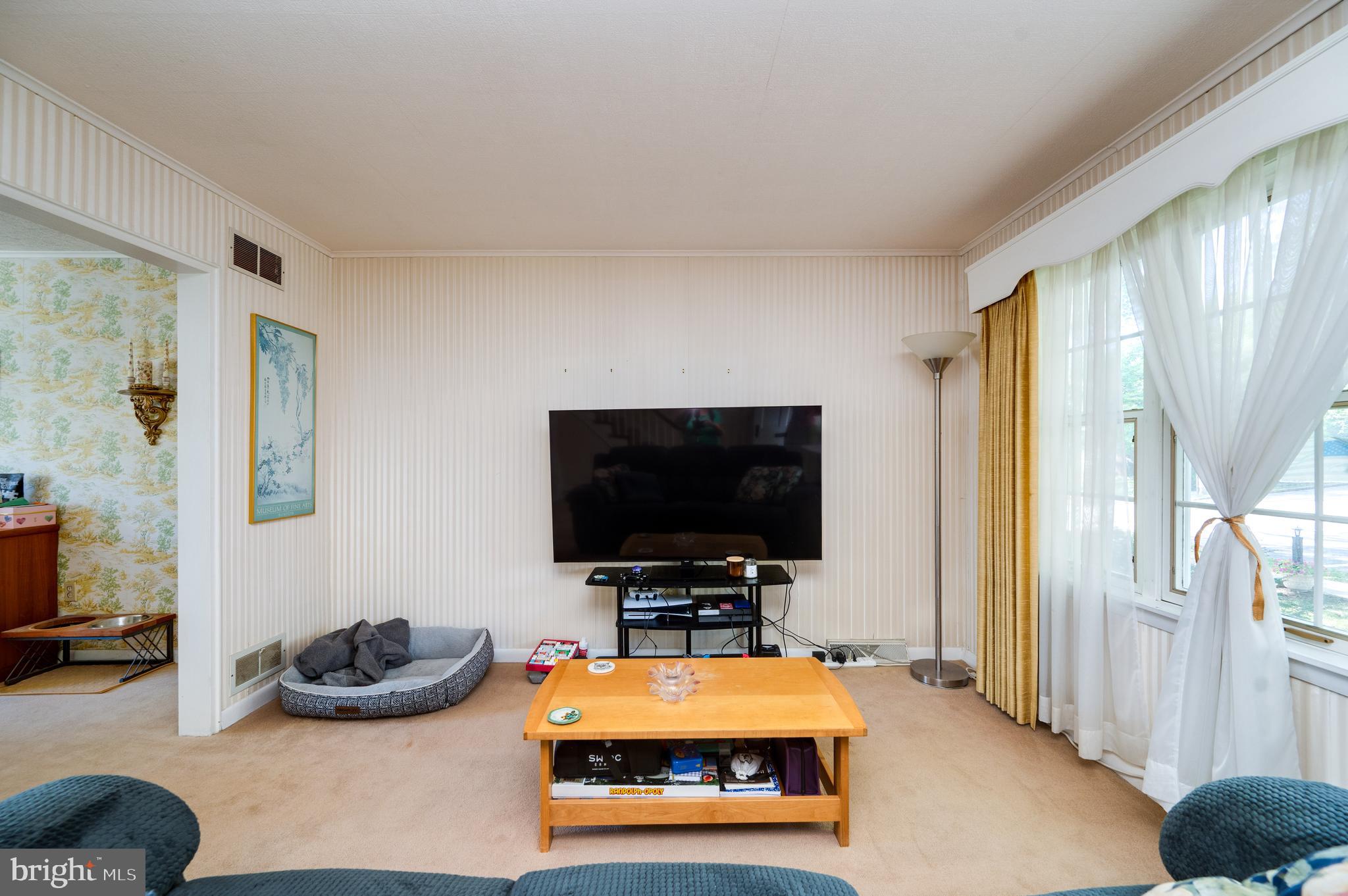 435 Sycamore Road Reading, PA 19611 - Photo 8 of 42 a room with furniture and a flat screen tv