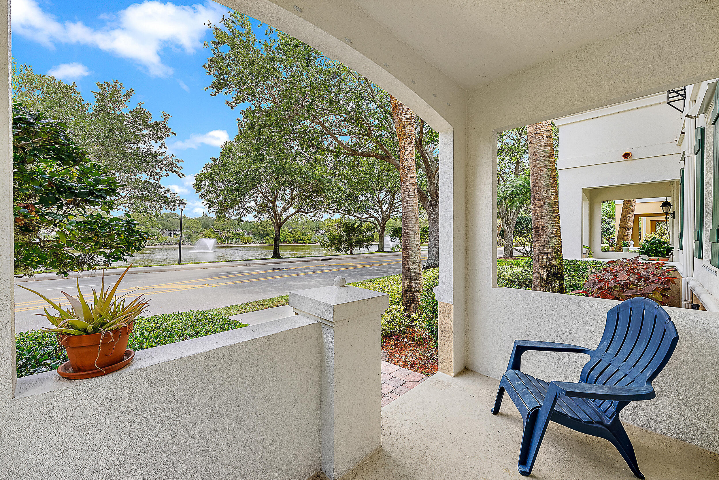 107 Rivinia Drive Jupiter, FL 33458 - Photo 17 of 28 a view of a house with backyard and sitting area