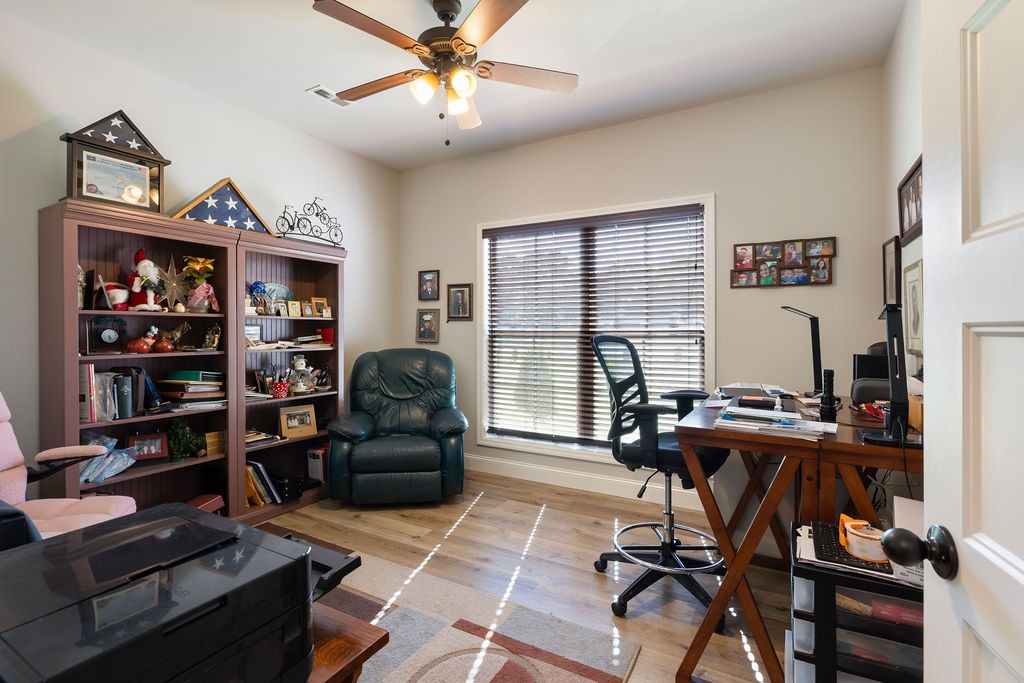 411 Bumpas Road Lawrenceburg, TN 38464 - Photo 19 of 30 a view of a livingroom with furniture and lounge chair