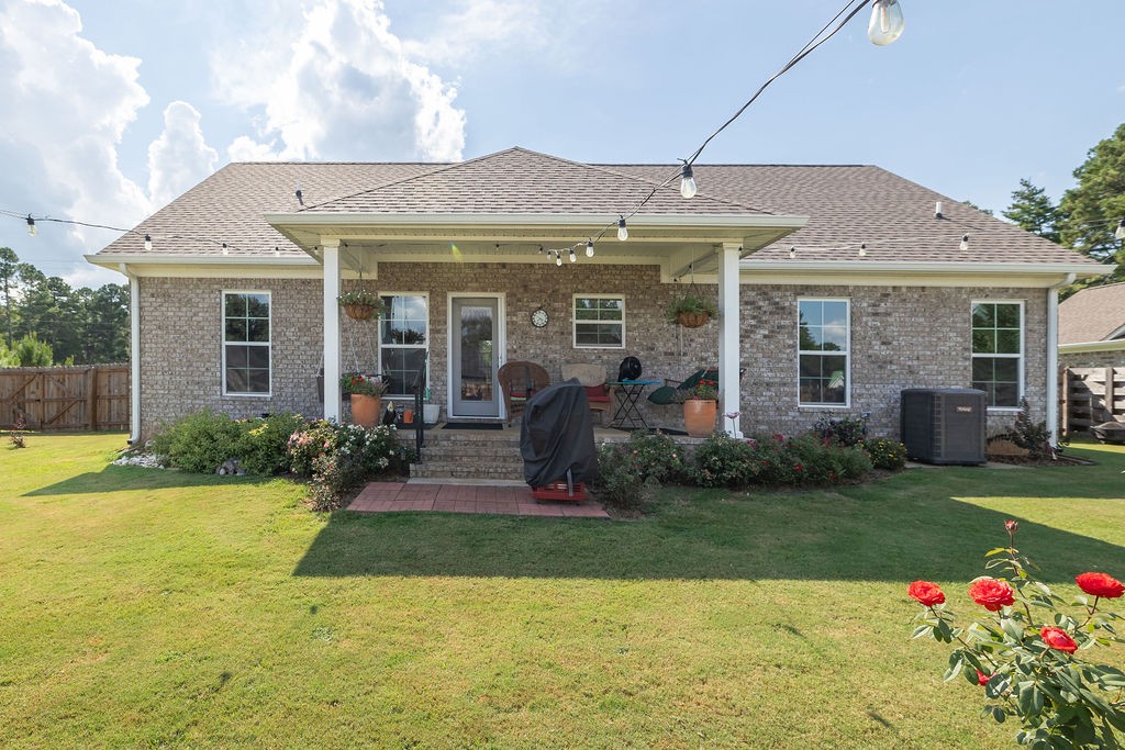 411 Bumpas Road Lawrenceburg, TN 38464 - Photo 23 of 30 a front view of a house with garden