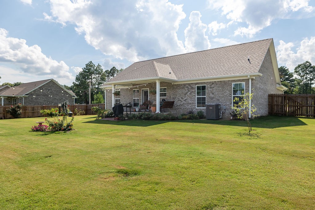 411 Bumpas Road Lawrenceburg, TN 38464 - Photo 24 of 30 a view of a house with a swimming pool