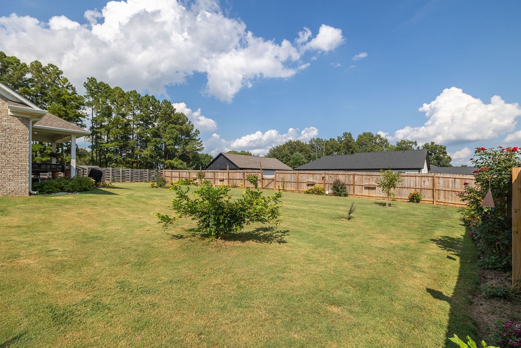 411 Bumpas Road Lawrenceburg, TN 38464 - Photo 27 of 30 a view of a lake with a big yard