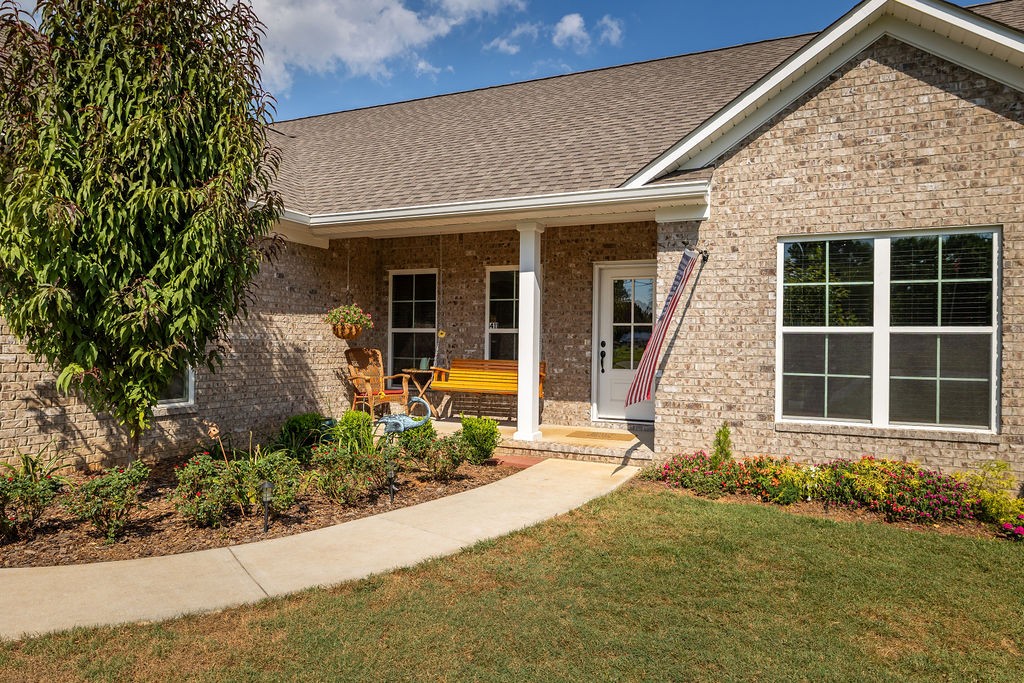 411 Bumpas Road Lawrenceburg, TN 38464 - Photo 4 of 30 front view of a house with a yard