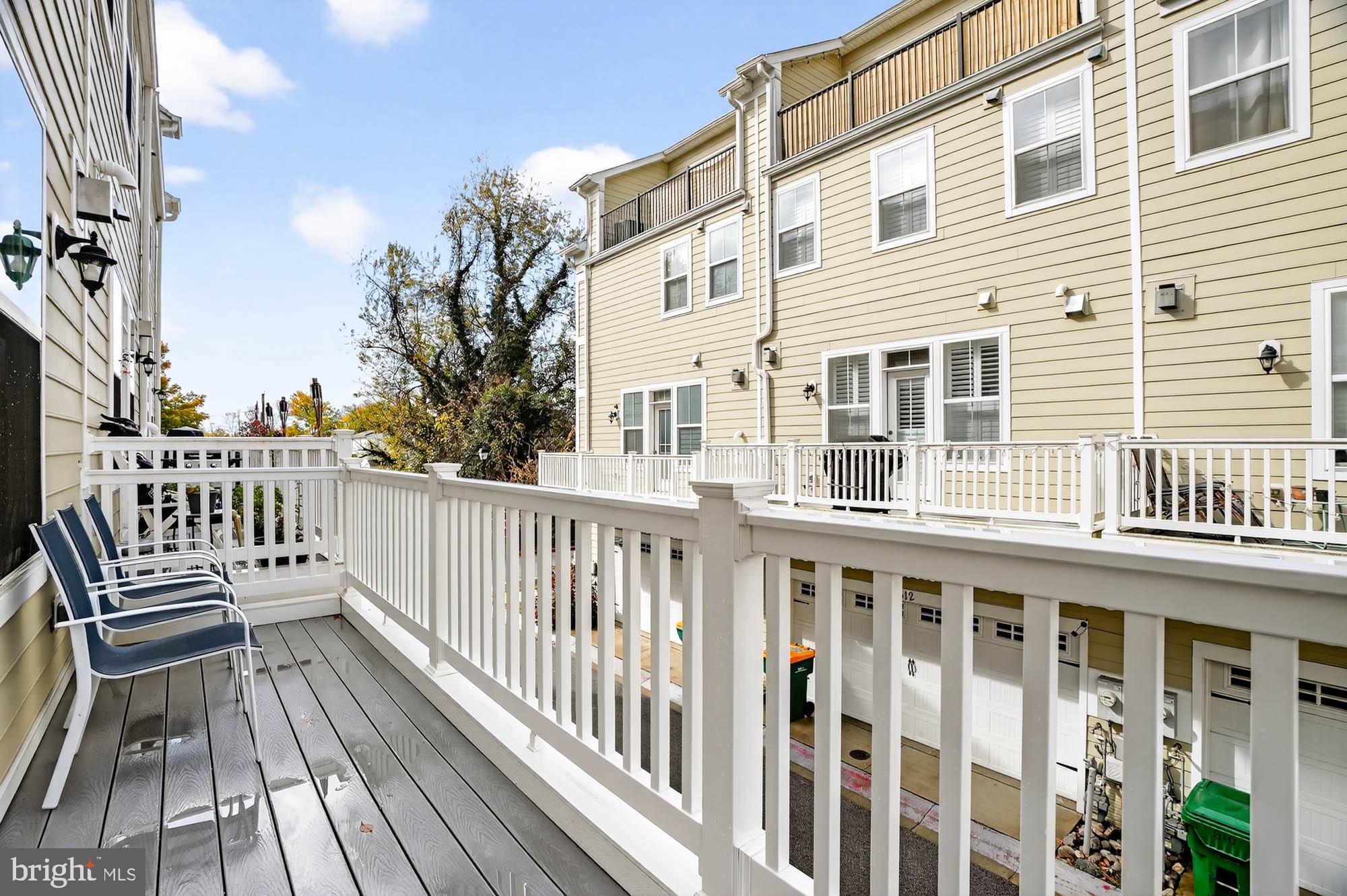 606 James Walker Place Annapolis, MD 21401 - Photo 14 of 52 a view of a brick building from a balcony