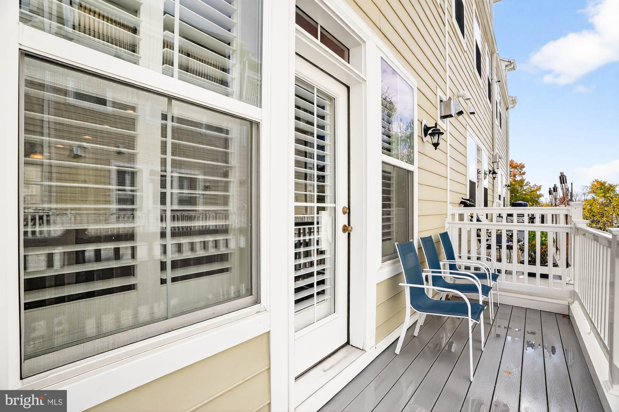 606 James Walker Place Annapolis, MD 21401 - Photo 15 of 52 a view of a balcony with wooden floor and fence