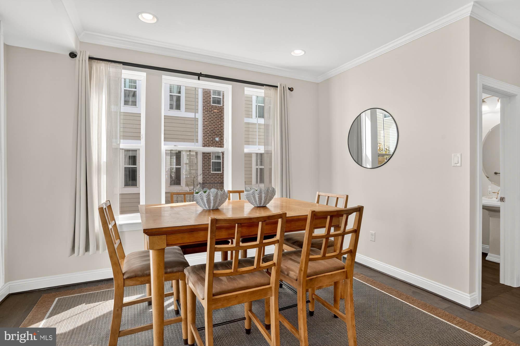 606 James Walker Place Annapolis, MD 21401 - Photo 22 of 52 a dining room with furniture window and wooden floor