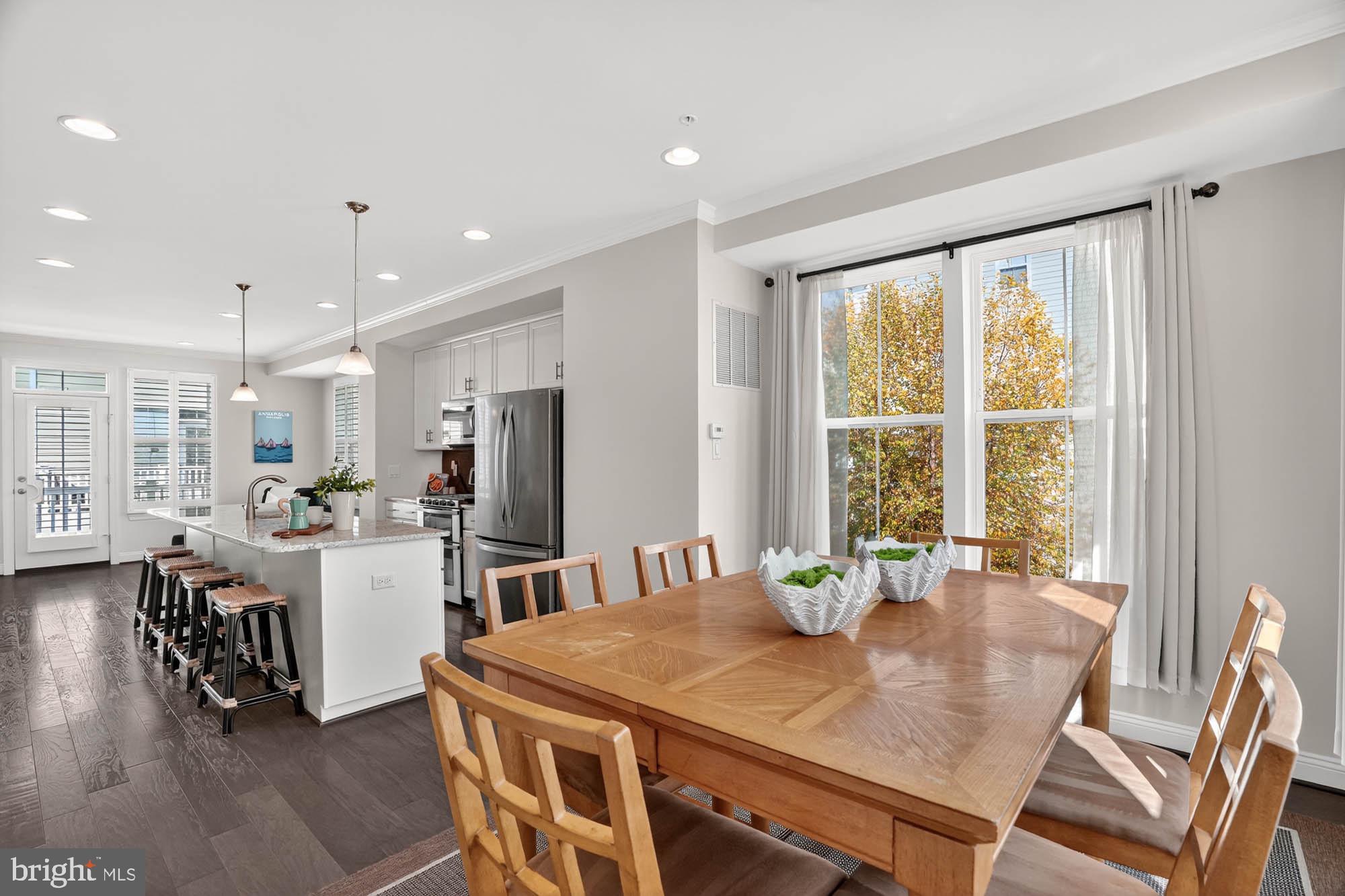 606 James Walker Place Annapolis, MD 21401 - Photo 24 of 52 a view of a dining room with furniture window and outside view