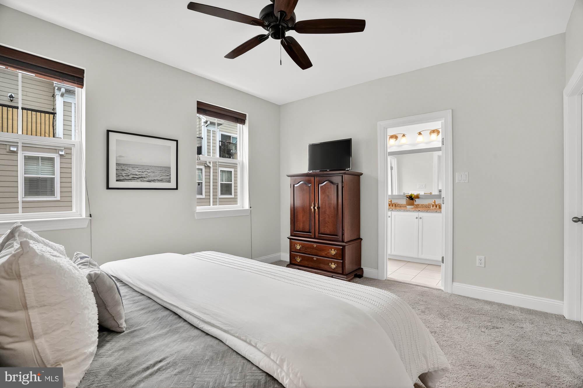 606 James Walker Place Annapolis, MD 21401 - Photo 27 of 52 a bedroom with a bed dresser and a window