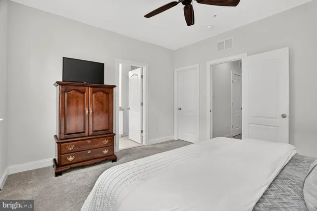 a view of outdoor space with garden and signage