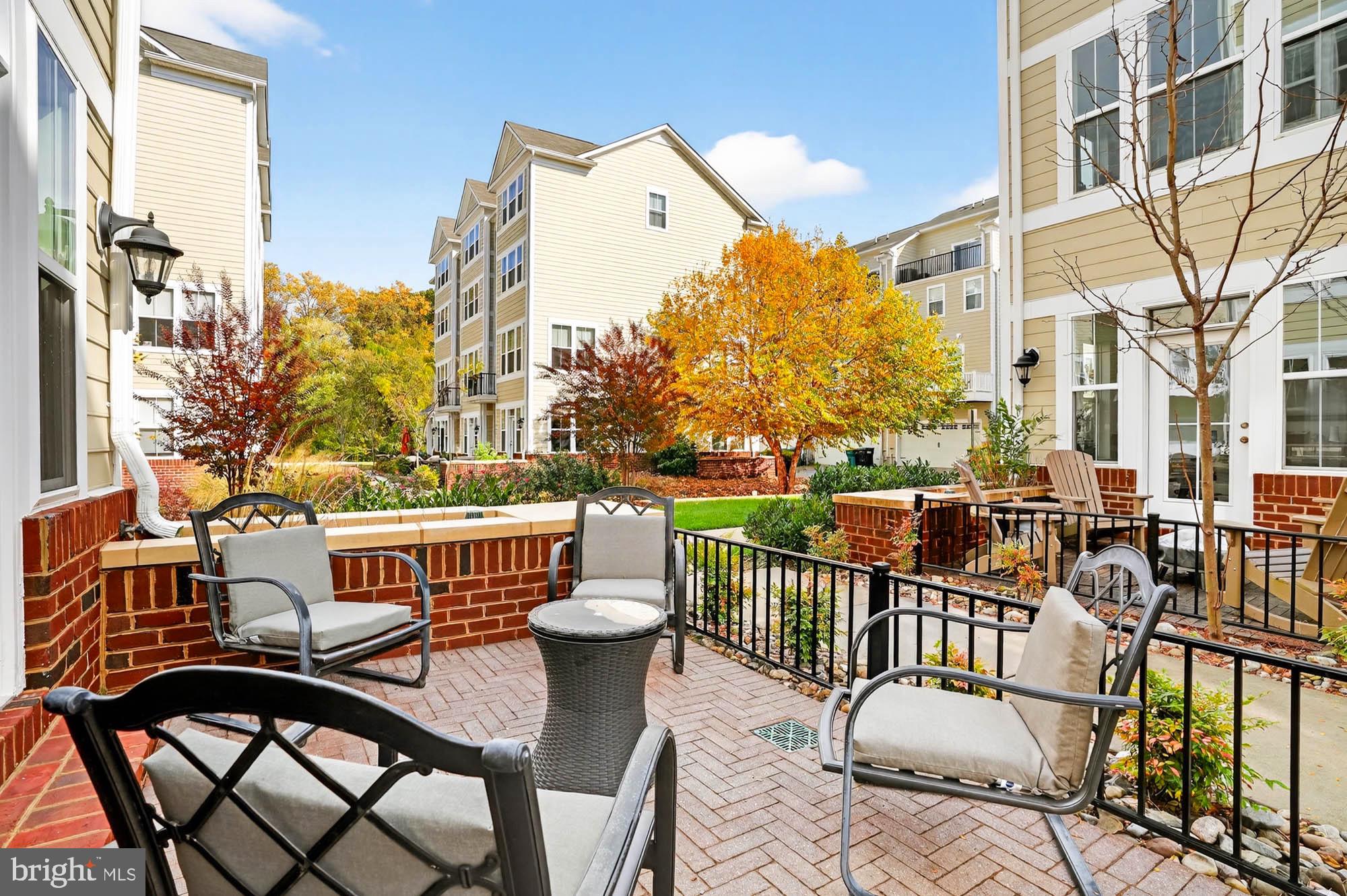 606 James Walker Place Annapolis, MD 21401 - Photo 4 of 52 a view of a chairs and table on the deck