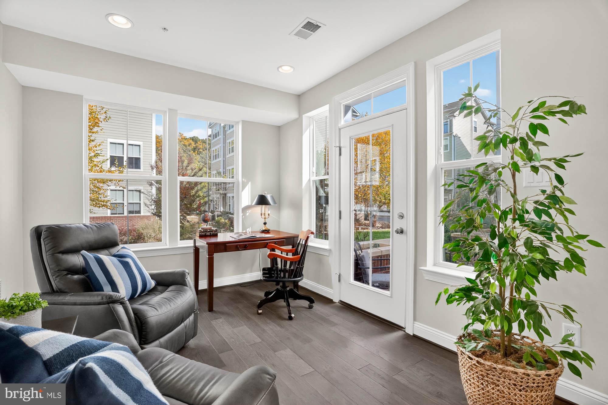 606 James Walker Place Annapolis, MD 21401 - Photo 7 of 52 a living room with furniture and a potted plant