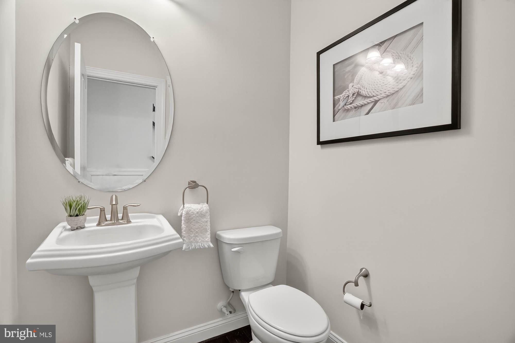 606 James Walker Place Annapolis, MD 21401 - Photo 10 of 52 a bathroom with a toilet and a sink